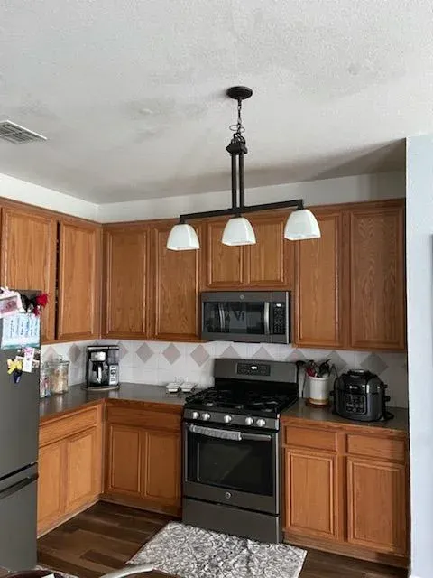 Cabinet Refinish · Before